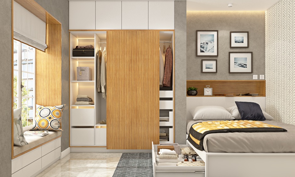 Sliding wardrobe has open shelves and rod to hang oversized clothing is the perfect sliding wardrobe design