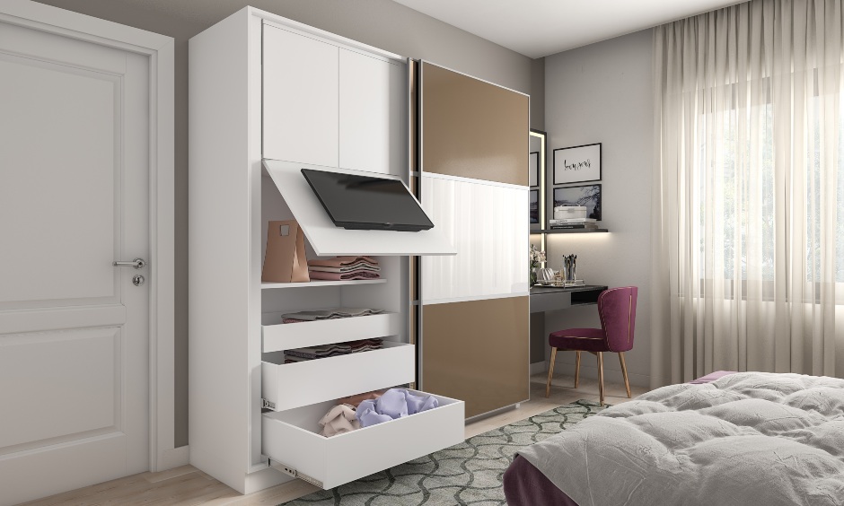 Wardrobe design with a flip up tv panel, sliding doors with hidden storage is perfect for small rooms